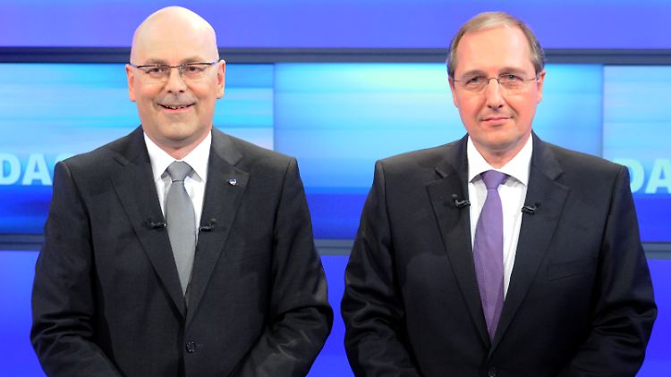 Wirklich glücklich sehen sie nicht aus: Torsten Albig (l.) und Jost de Jager. Die Parteien der Spitzenkandidaten von SPD und CDU haben eine düstere gemeinsame Geschichte.
