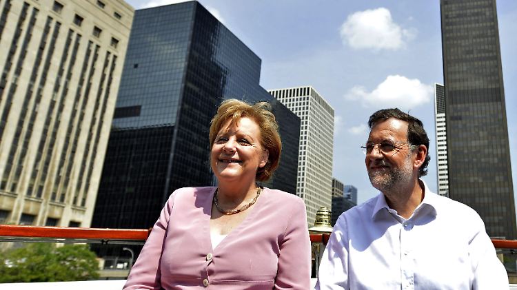 Begegnung in Chicago: Spaniens Ministerpräsident Rajoy wirbt angeblich bei Kanzlerin Merkel für direkte Hilfen der EZB an spanische Banken.