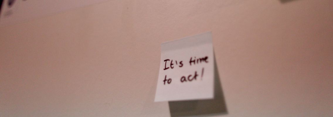 Ein Zettel mit der Aufschrift "It's time to act" klebt bei der UN-Klimakonferenz in Kopenhagen am deutschen Delegationsbüro.