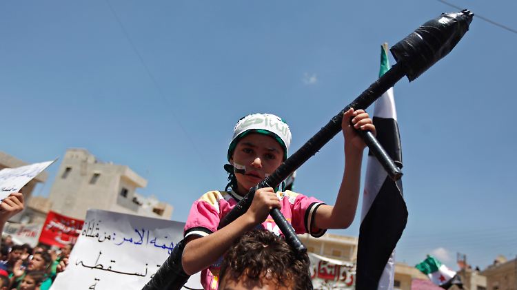 Ein syrisches Kind auf einer Anti-Assad-Demonstration.