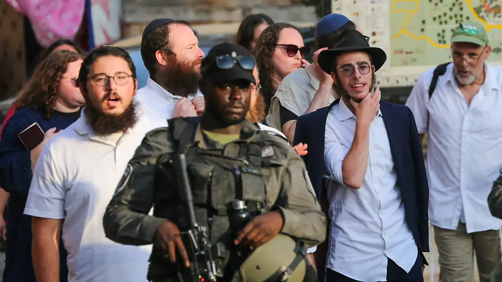 AFP-20250810-MEI-Palestine-MS-ISHOCA9-20250809-038-v1-HighRes-IsraeliSettlersHe