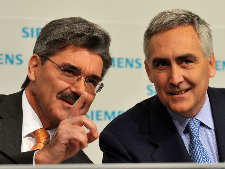 Wohin geht die Reise? Joe Kaeser (links) mit seinem Chef Peter Löscher.