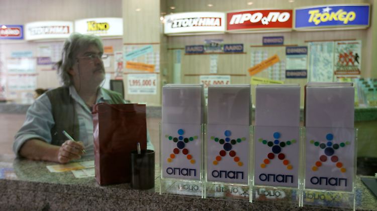 Neben der griechischen Lotterie geht wohl nur ein Gebäude in Athen über den Tisch.