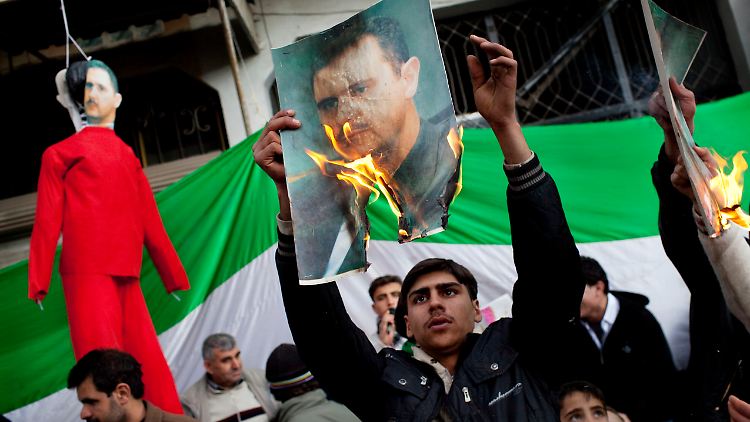 Etliche Syrer fordern den Tod Assads.