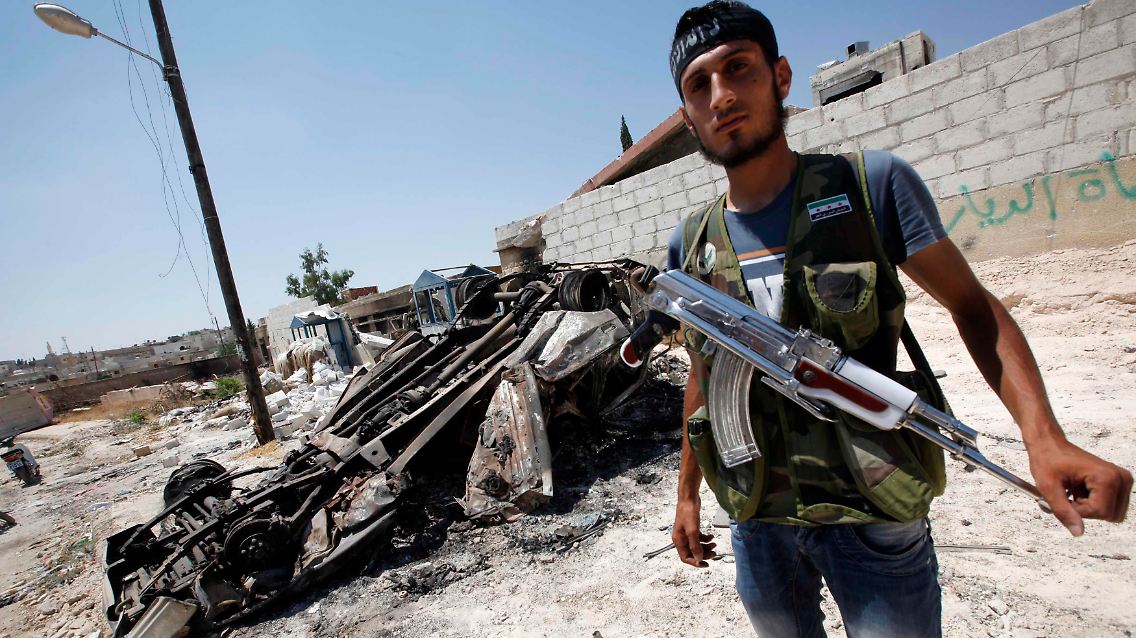 2012-07-25T141428Z_01_ANK03_RTRMDNP_3_SYRIA-CRISIS.JPG9172528528344228366.jpg