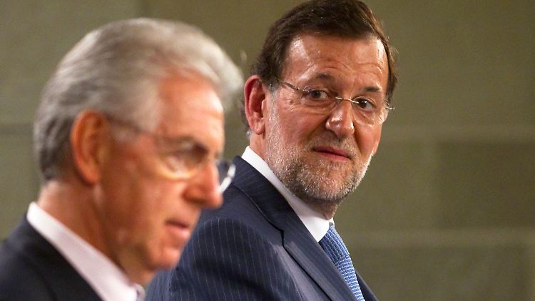 Monti und Rajoy halten sich mit Äußerungen nach Draghis Worten noch zurück.