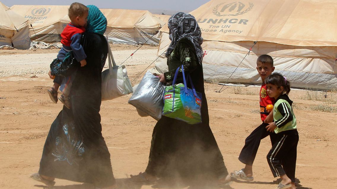 2012-08-08T120633Z_01_AMM04_RTRMDNP_3_JORDAN-SYRIA-CRISIS.JPG5114279990777890287.jpg