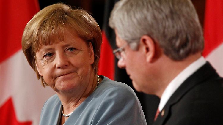 Merkel umgarnt Harper.