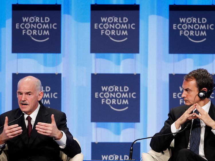 Rechtfertigung im Alpenstädtchen: Griechenlands Premierminister George Papandreou (links) spricht, Spaniens Premier Jose Luis Rodriguez Zapatero hört zu.