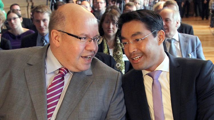 Altmaier (l) und Rösler haben unterschiedliche Ansichten.