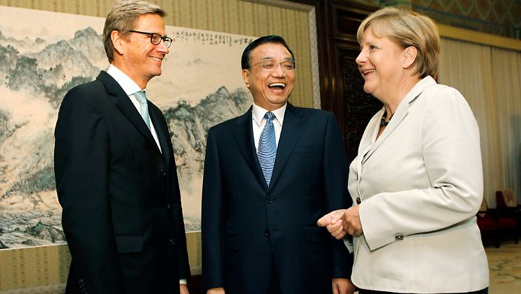 Westerwelle und Merkel sprachen das Thema Pressefreiheit in Peking an.