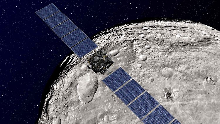 "Dawn" vor dem Asteroiden Vesta.