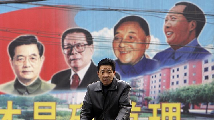 Ein Wandbild in der Stadt Gujiao zeigt die Staatschefs Hu Jintao, Jiang Zemin, Deng Xiaoping und Mao Zedong (v.l.).