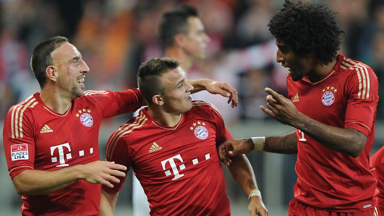 Festwochen in München: Franck Ribéry, Xherdan Shaqiri und Dante freuen sich über den Sieg gegen Wolfsburg.
