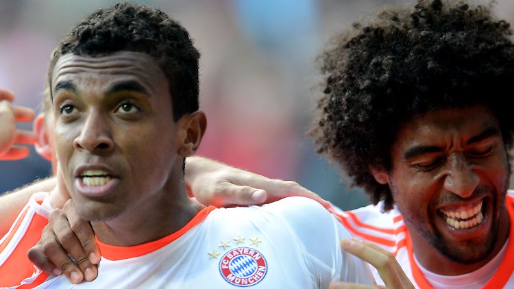 Luiz Gustavo und Dante - Brasilianer in Diensten des FC Bayern München.