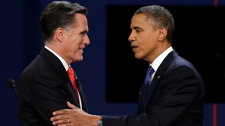 Romney und Obama begrüßen sich vor der ersten Fernsehdebatte.