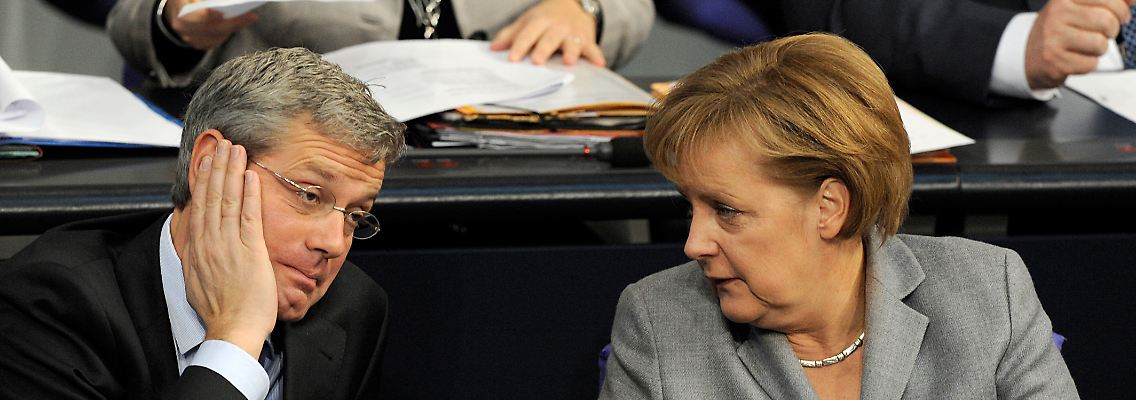 Röttgen und Merkel - mal einig, mal uneins.
