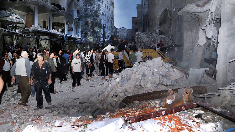 Eine Bombenexplosion zerstörte Häuser in Damaskus.