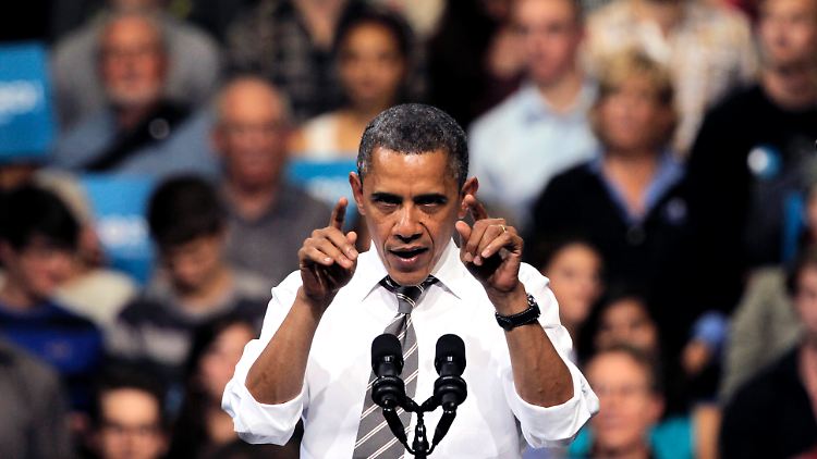 Brack Obama freut sich über neu geschaffene Jobs.