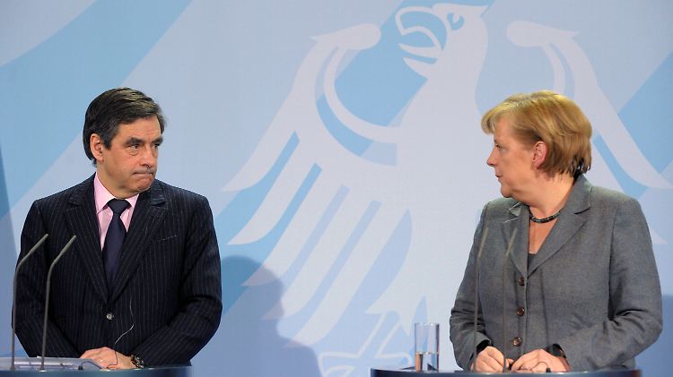 Einig im Kampf gegen Staatskrisen: Der französische Premierminister Fillon und Bundeskanzlerin Merkel.