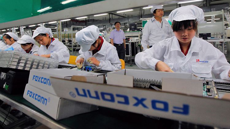 Angestellte von Foxconn im Lunghua-Werk in Shenzhen, China.