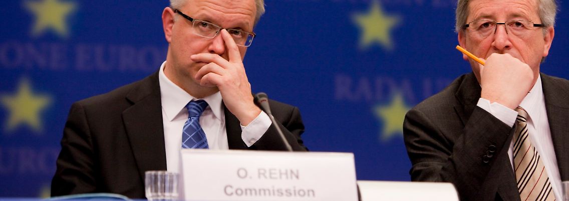 Ernste Gesichter: Wirtschaftskommissar Olli Rehn (links) neben Euro-Gruppen-Chef Jean-Claude Juncker.