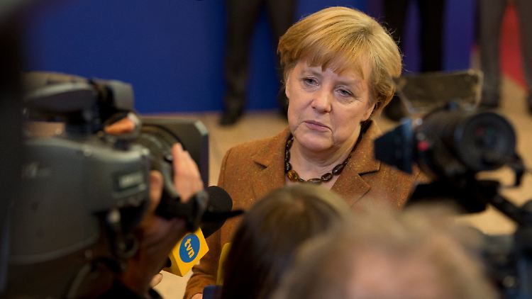 Merkel scheint beinahe resigniert zu sein.
