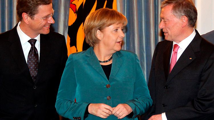 Alles wieder gut? Köhler mit Kanzlerin Merkel und ihrem Vize Westerwelle.