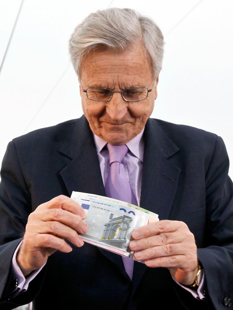 War die Rettungsaktion notwendig, Herr Trichet? Ifo-Chef Sinn sagt Nein. Der EZB-Chef bei der Grundsteinlegung der neuen EZB-Zentrale, wie er Euro-Banknoten in die Kassette legt, die in das Fundament eingemauert wird..