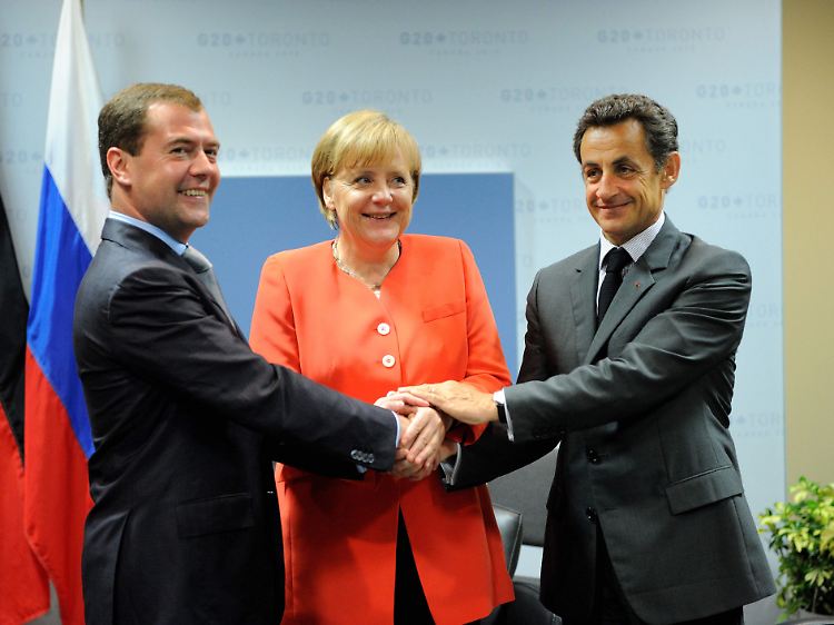 Demonstrative Einigkeit: Russlands Präsident Medwedew, Kanzlerin Merkel und Frankreichs Präsident Sarkozy.