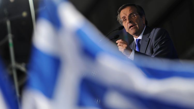 Griechenlands Ministerpräsident Samaras: IWF und EZB wollen, dass die Euro-Länder auf die Hälfte ihrer Forderungen gegen Athen verzichten.