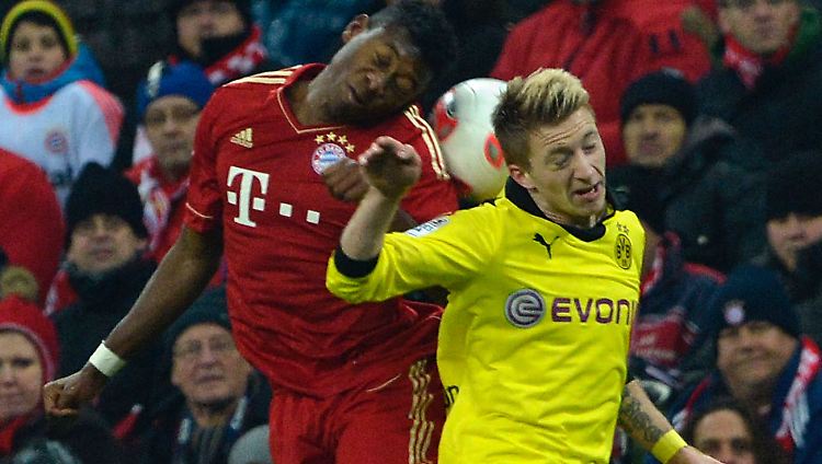 Und wo ist der Ball? Dortmunds Marko Reus und der Münchner David Alaba bemühen sich um ihn.