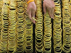 Kitajski vlagatelji rekordno posojajo za nakup lokalnih delnic, zlato dosega nove rekordne vrednosti