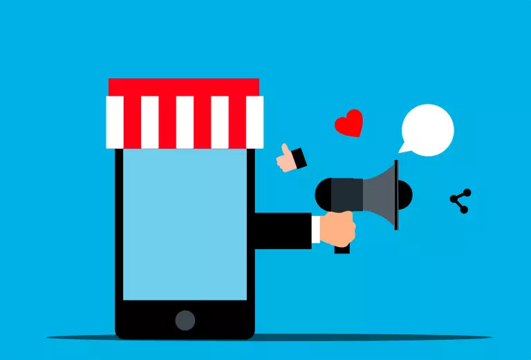 Ein Megaphon erzählt etwas aus einem Telefon heraus. In unserem Artikel zeigen wir Dir alles über Empfehlungsmarketing